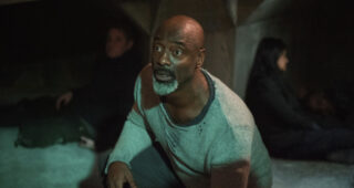 Les 100 : photo, Isaiah Washington