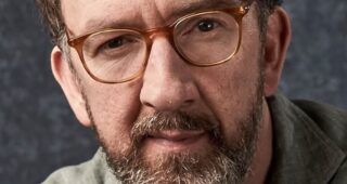 John Carney (V) : Photo officielle