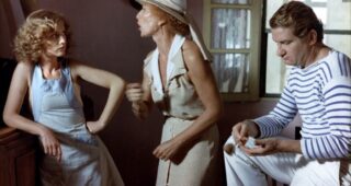 Coup de torchon : photo, Isabelle Huppert, Eddy Mitchell, Stéphane Audran